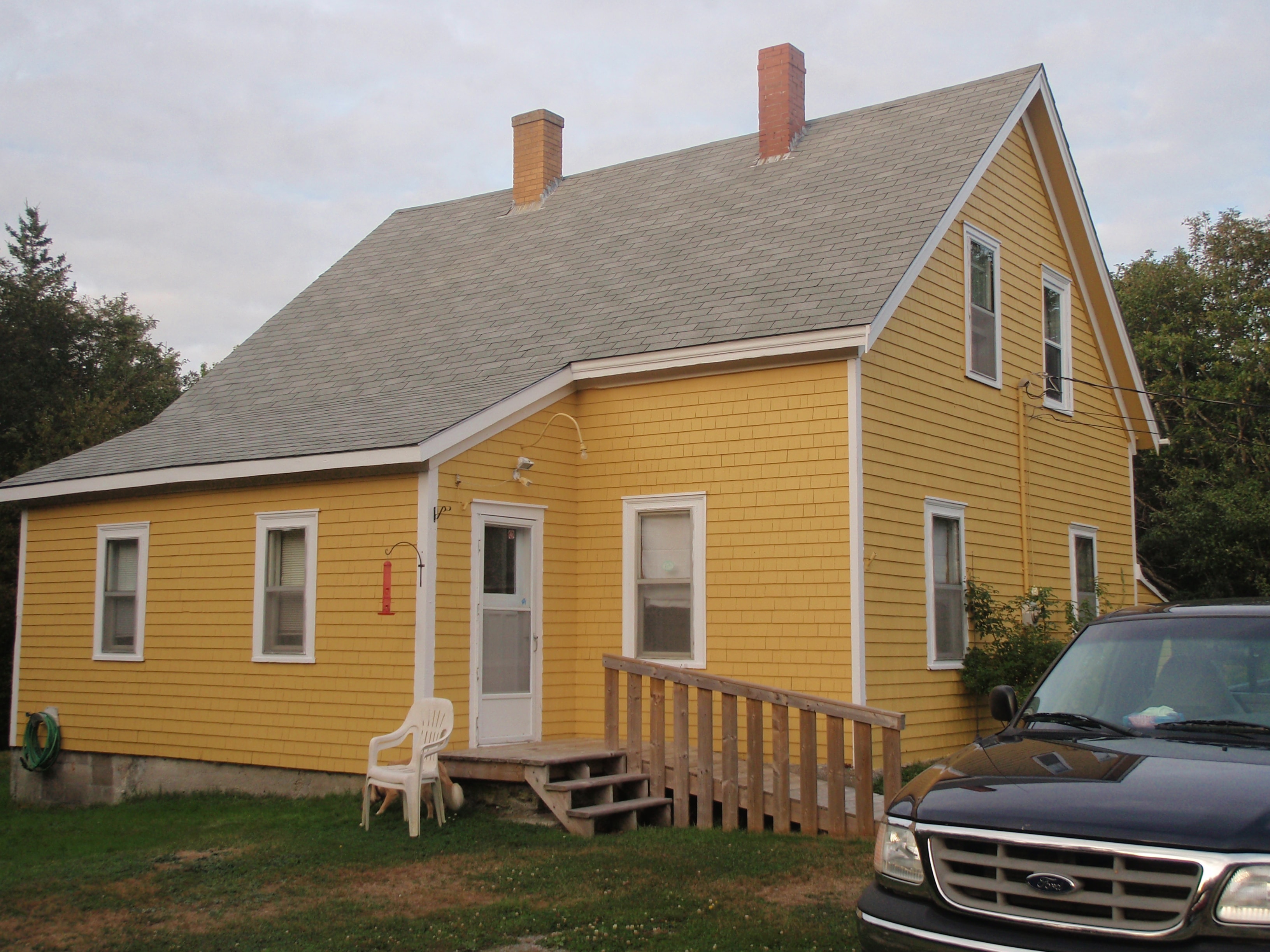 Yellow house — before remodel, front view